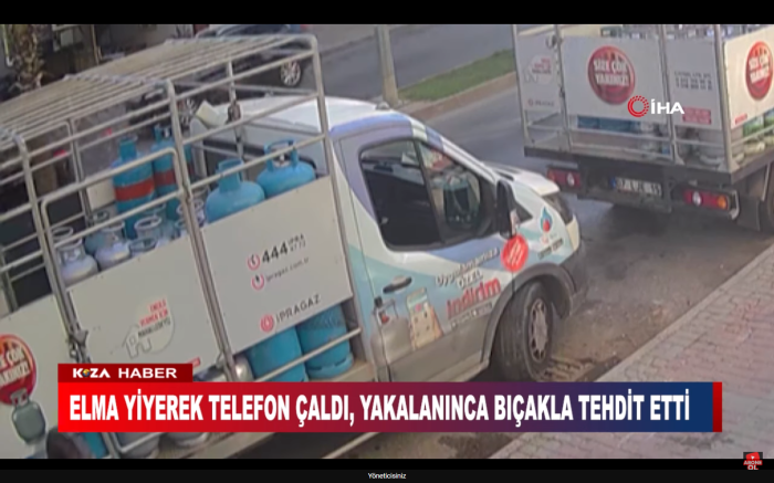 ELMA YİYEREK TELEFON ÇALDI, YAKALANINCA BIÇAKLA TEHDİT ETTİ